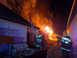 oltják az égő házat